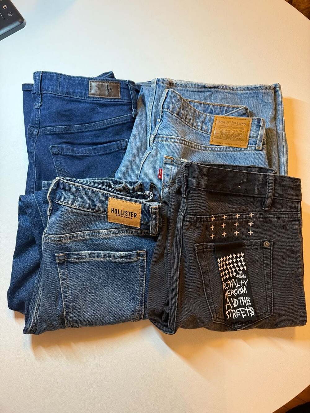 Lot of 4 Women's Jeans: Ksubi, Levi's, and 2x Hollister (Sizes 27-29)